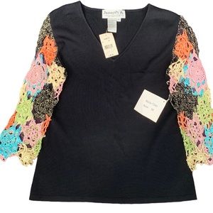 Woman’s Joseph A Size M Vintage Black with colorful crocheted flower sleeves.